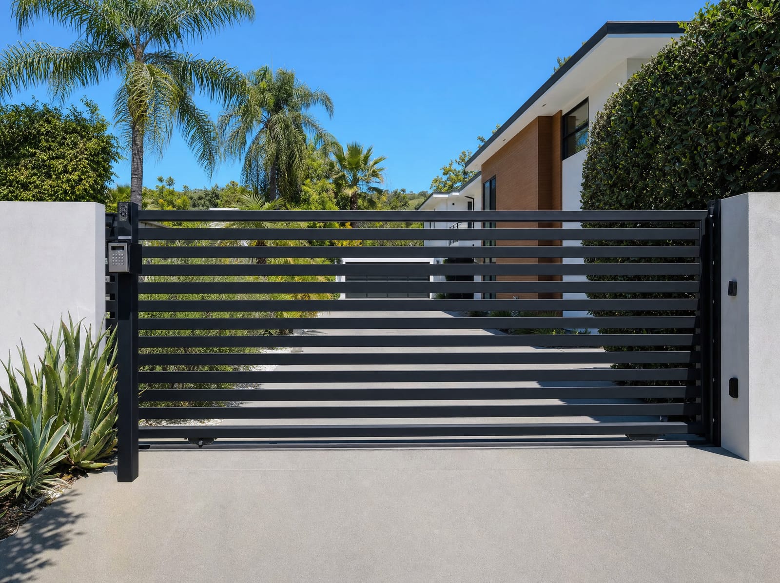 Automated aluminum sliding driveway gate in Southern California